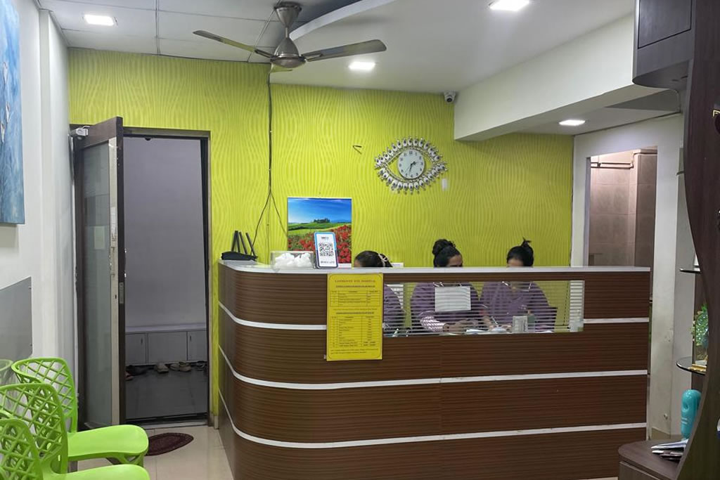 Reception and patient registration desk at Laxmi Jyot Eye Hospital in Thane
